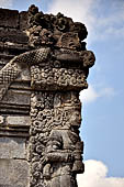 Candi Panataran - Naga Temple. Priestly figure and corner naga. 